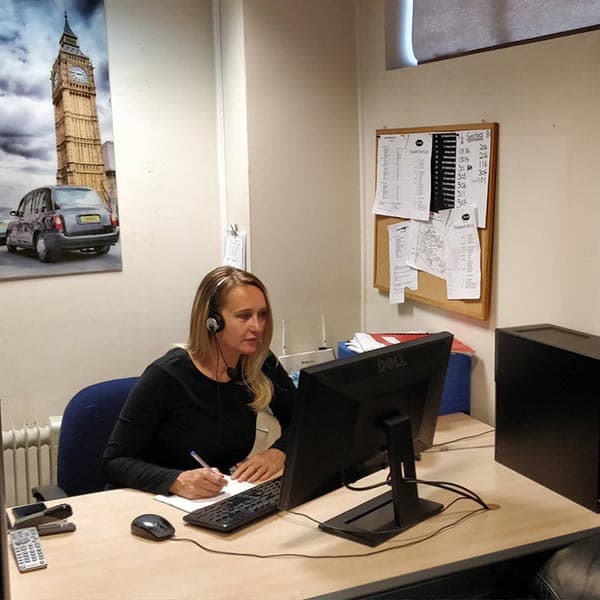 A Western Cars controller at work in the office